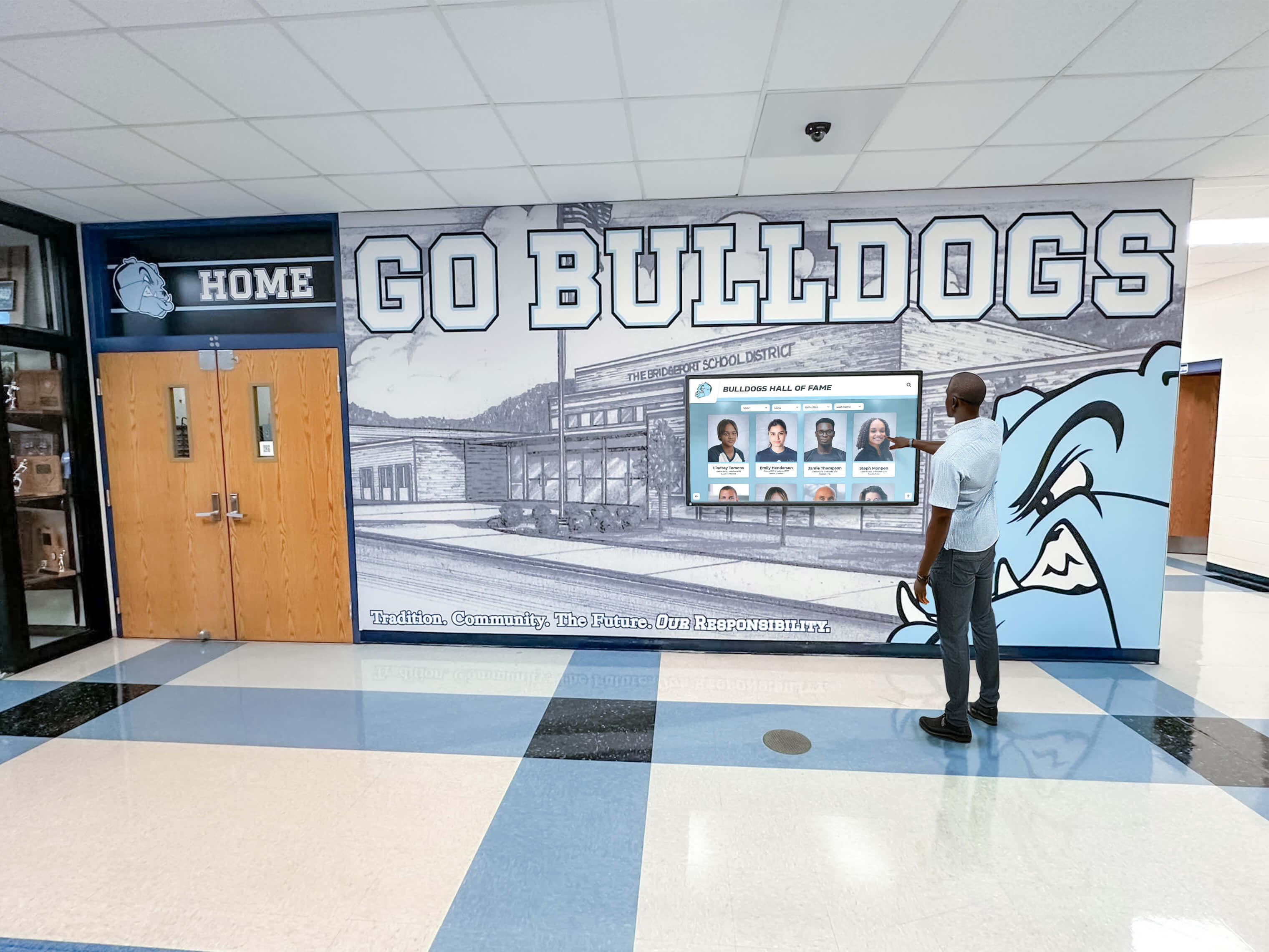 Visitor using informational touchscreen in school hallway Informational display